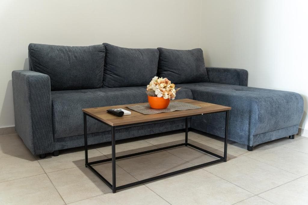 Nerina Studio interior with bed and lounge setup