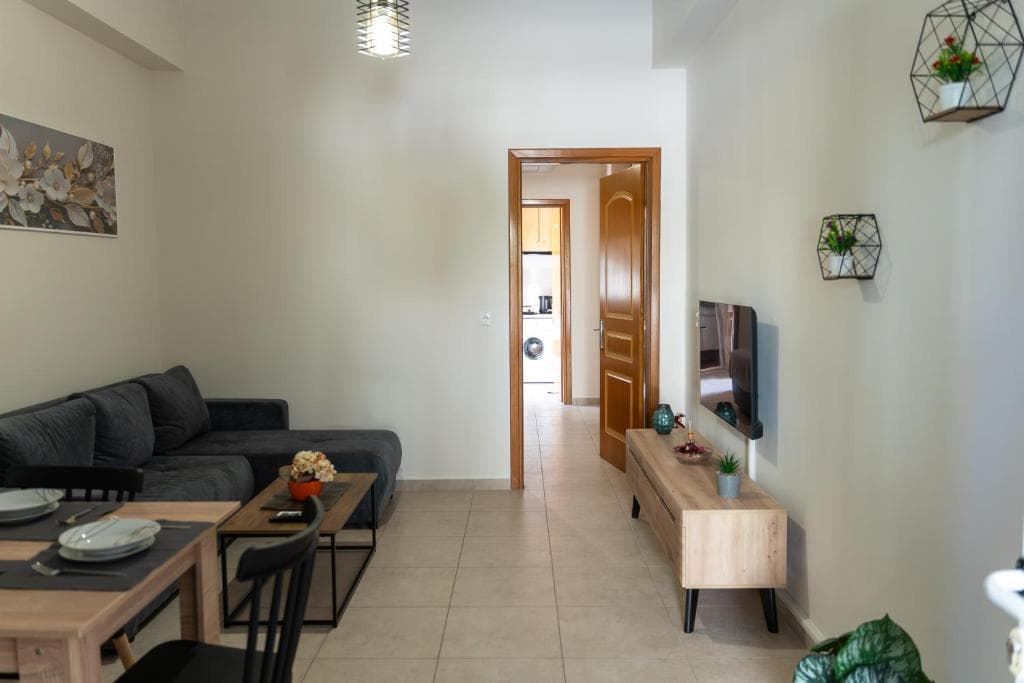 Nerina Studio living area with sofa and dining setup